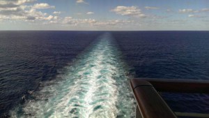 Foamy water created from the propellers of the ship. 