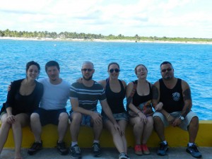 Me (making a weird face) and my family. This is a pretty good idea on how blue the water is.