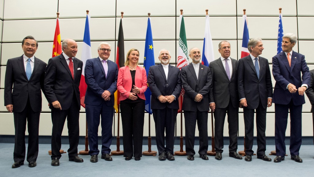 Chinese Foreign Minister Wang Yi, French Foreign Minister Laurent Fabius, German Foreign Minister Frank Walter Steinmeier, European Union High Representative for Foreign Affairs and Security Policy Federica Mogherini, Iranian Foreign Minister Mohammad Javad Zarif, Head of the Iranian Atomic Energy Organization Ali Akbar Salehi, Russian Foreign Minister Sergey Lavrov, British Foreign Secretary Philip Hammon, Secretary of State John Kerry and Secretary of Energy Ernest Moniz (L to R) pose for a group picture at the United Nations building in Vienna, Austria July 14, 2015. REUTERS/Joe Klamar/Pool